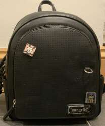 Black bag with glitter crown pin