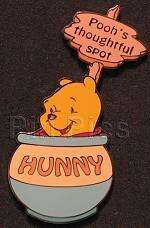 100243 - Winnie the Pooh in Honey Pot #2 - Disney Auctions