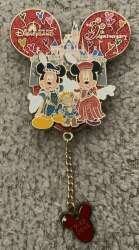 Mickey, Minnie and Duffy in Front of the Castle