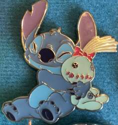 103196 - Stitch Hugging Scrump - Loungefly