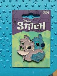 Stitch and Angel hugging.