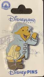 Pooh in blue rain coat