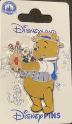 Pooh with flower bouquet