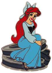 Ariel Sitting on Movie Reels