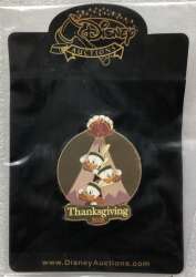 Huey, Dewie & Louie peeking out of a Tepee with a Turkey