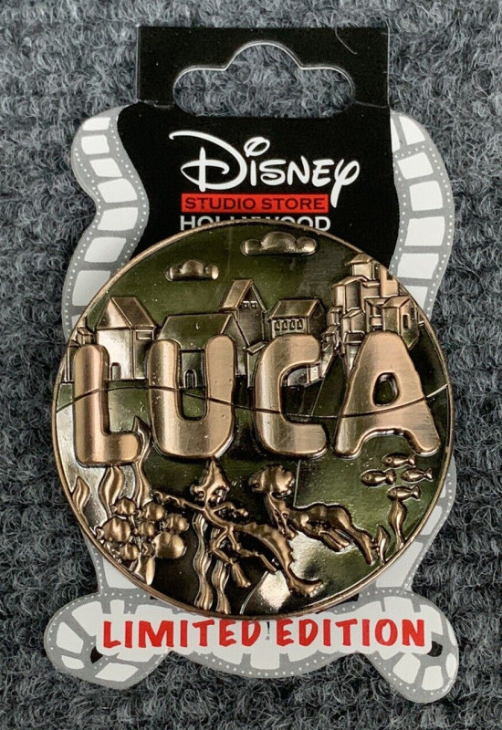 59796 3D Gold Die Cast Luca Logo Luca Disney Studio Store